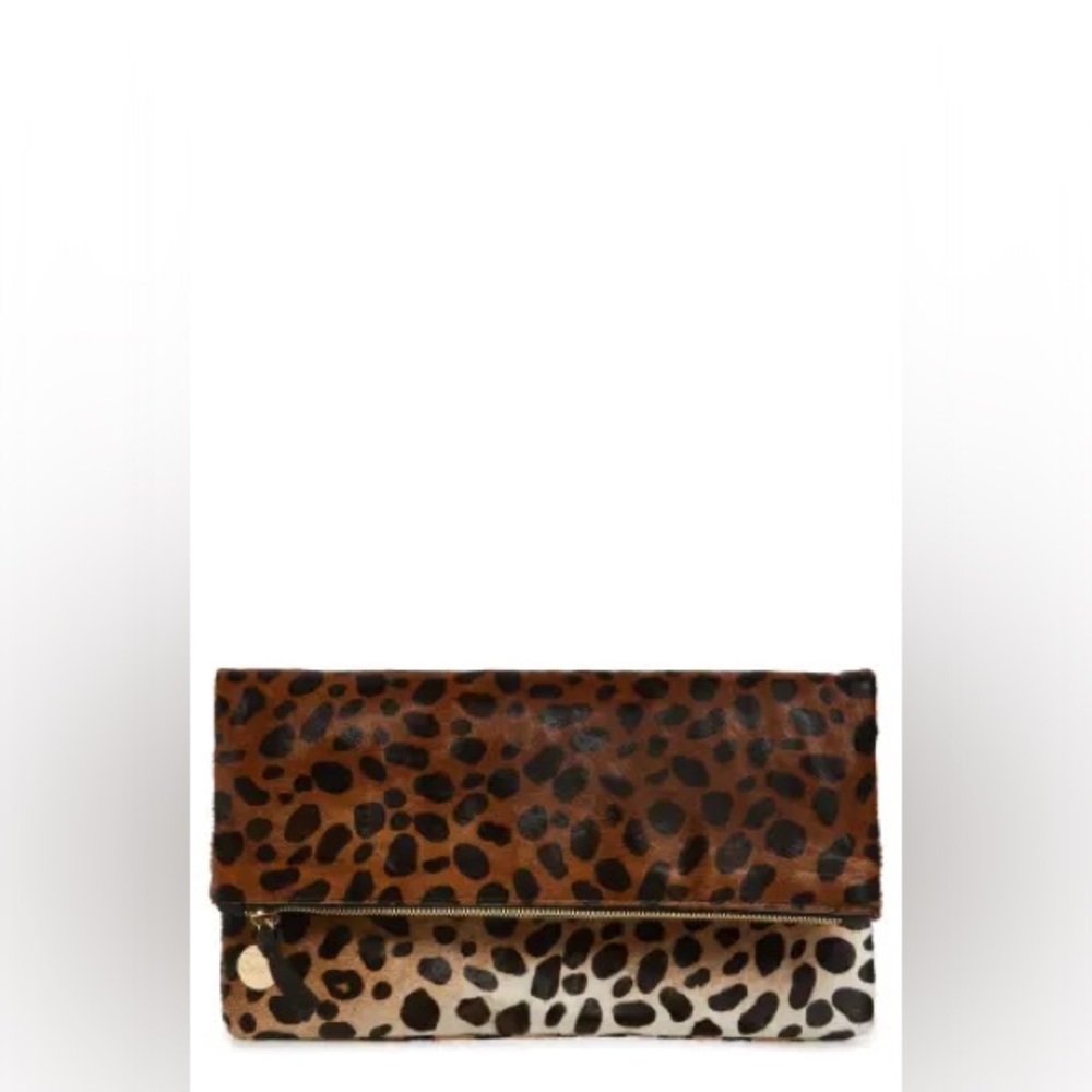 Clare V.
Genuine Calf Hair Foldover Clutch
Color: Tan
Size: O/S
$275.00